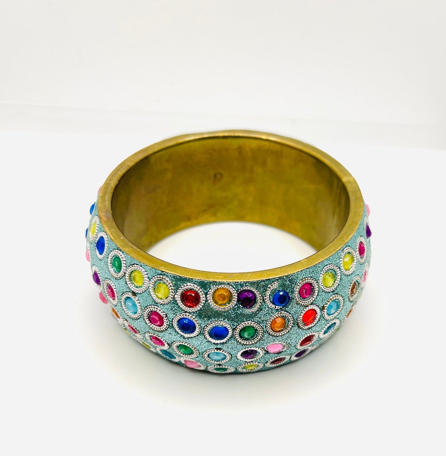 Vintage light blue rhinestone and brass bangle bracelet